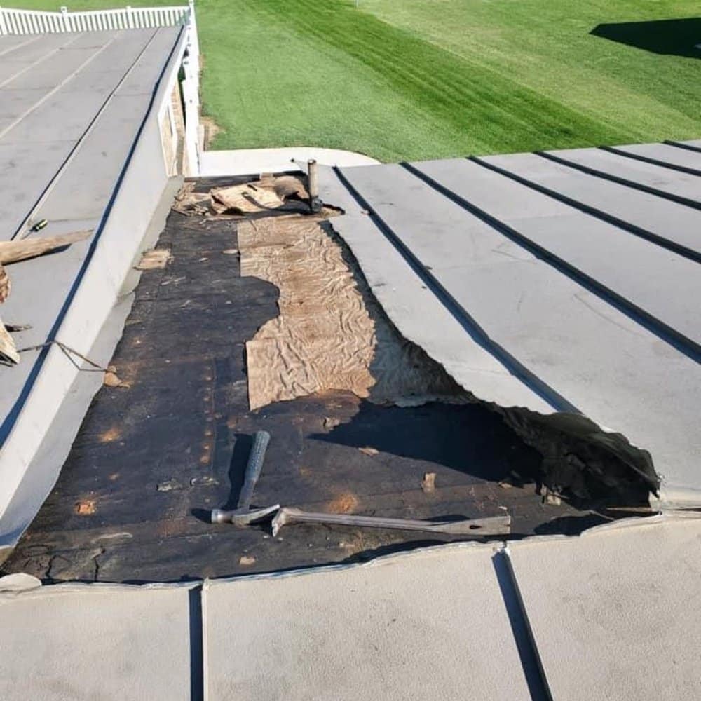 Project manager handling roof repair Lewisville TX insurance claim meeting